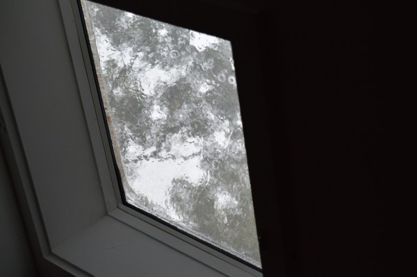 rain splattering on the skylight